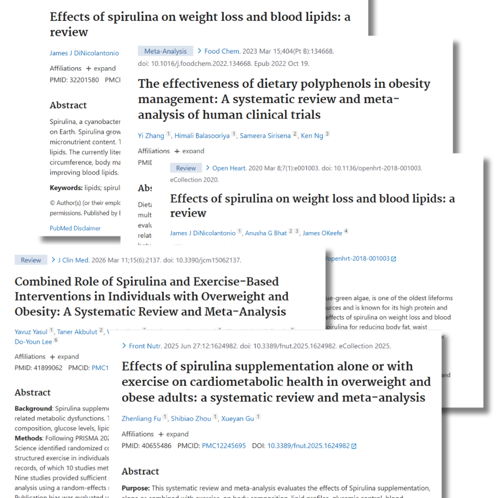 Stacked scientific research papers on spirulina, polyphenols and metabolism